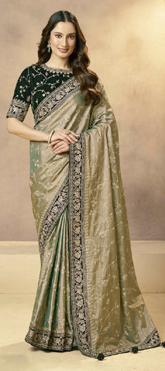 Green color Saree in Tissue fabric with Aari, Sequence, Zardozi work