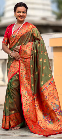 Green color Saree in Jacquard fabric with Weaving work