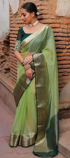 Pink and Majenta color Saree in Organza Silk fabric with Weaving work