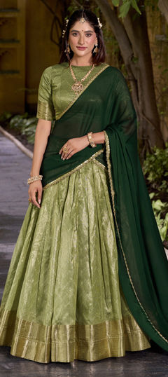 Green color Lehenga in Dupion Silk fabric with Weaving, Zari work
