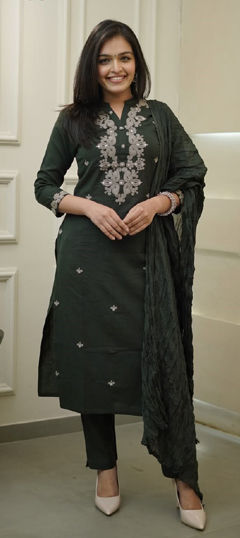Green color Salwar Kameez in Rayon fabric with Embroidered work