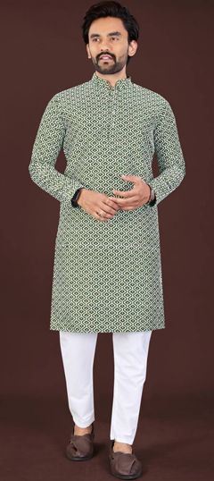 Green color Kurta Pyjamas in Cotton fabric with Embroidered, Thread work
