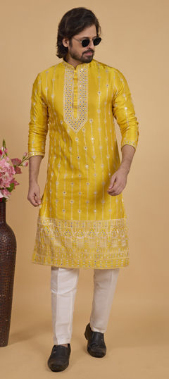 Yellow color Kurta Pyjamas in Art Silk fabric with Embroidered, Thread work