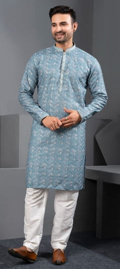 Blue color Kurta Pyjamas in Silk cotton fabric with Printed work