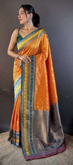 Orange color Saree in Banarasi Silk fabric with Weaving work