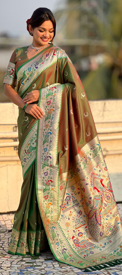 Green color Saree in Silk fabric with Weaving work