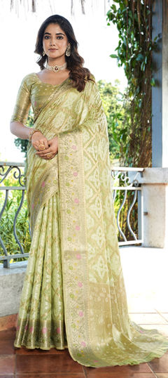 Green color Saree in Organza Silk fabric with Weaving work