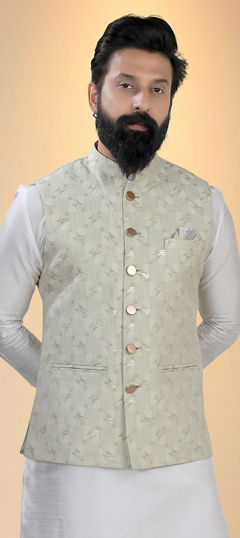 Green color Nehru Jacket in Silk cotton fabric with Weaving work
