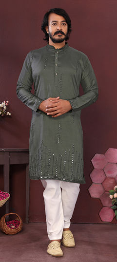 Green color Kurta Pyjamas in Silk fabric with Embroidered, Mirror work