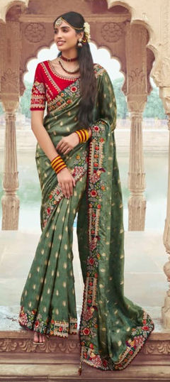 Green color Saree in Silk fabric with Embroidered, Sequence, Thread, Zari work