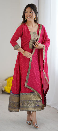Pink and Majenta color Salwar Kameez in Silk fabric with Border work