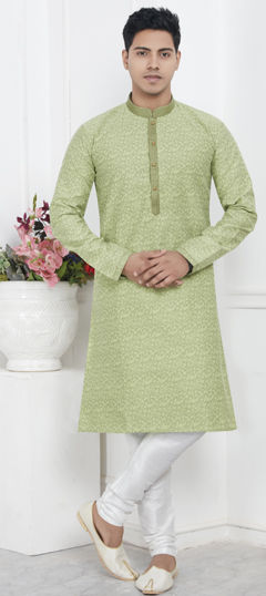 Green color Kurta Pyjamas in Jacquard fabric with Weaving work
