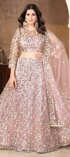 Pink and Majenta color Lehenga in Net fabric with Sequence work