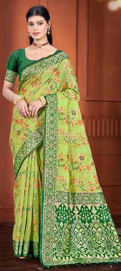 Green color Saree in Silk cotton fabric with Weaving work