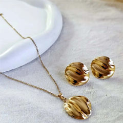 Gold Rodium Polish Beige and Brown color Pendant in Brass, Metal Alloy studded with Artificial