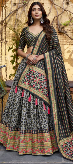 Black and Grey color Lehenga in Tussar Silk fabric with Border work