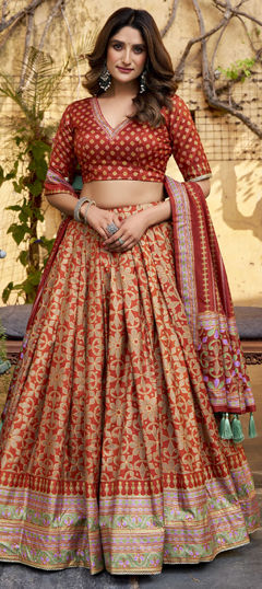 Orange color Lehenga in Tussar Silk fabric with Border work