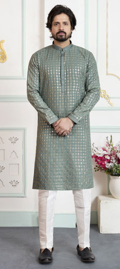 Green color Kurta Pyjamas in Art Silk fabric with Embroidered work