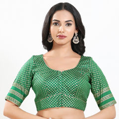 Green color Blouse in Brocade fabric with Weaving work