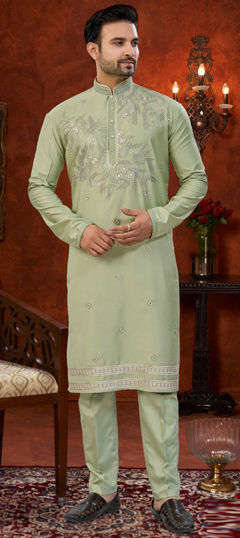 Green color Kurta Pyjamas in Silk fabric with Embroidered, Thread work