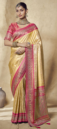 Yellow color Saree in Jacquard fabric with Zircon work