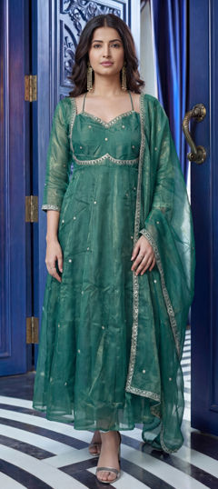 Green color Salwar Kameez in Tissue fabric with Embroidered work