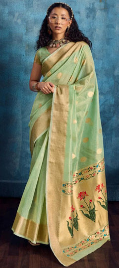 Green color Saree in Tissue fabric with Weaving, Zari work