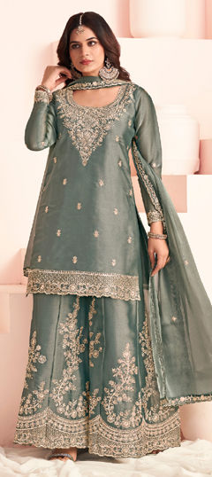 Green color Salwar Kameez in Silk fabric with Embroidered work