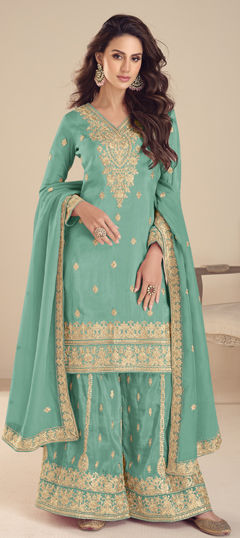 Green color Salwar Kameez in Silk fabric with Embroidered work