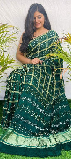 Green color Saree in Silk fabric with Bandhej, Printed work