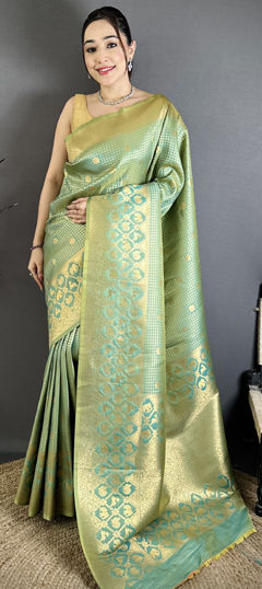 Green color Saree in Banarasi Silk fabric with Weaving work