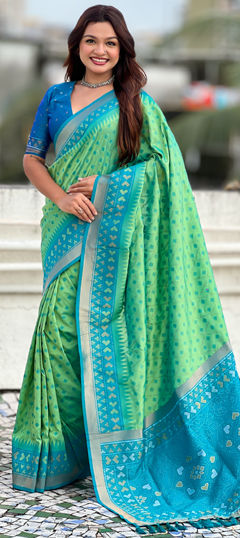 Green color Saree in Patola Silk fabric with Weaving work