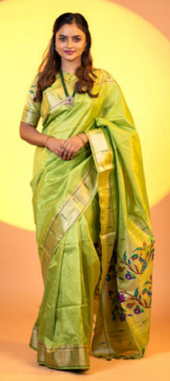 Green color Saree in Raw Silk fabric with Weaving work