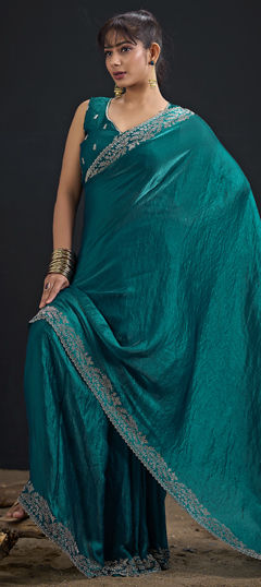 Green color Saree in Tissue fabric with Zircon work