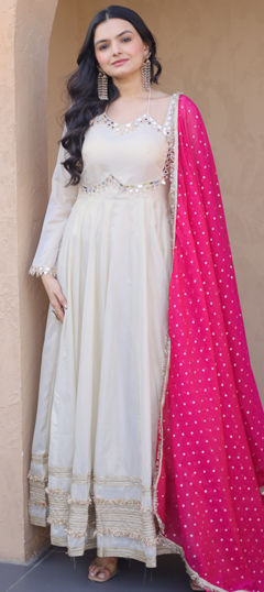 Pink and Majenta color Gown in Crepe Silk fabric with Embroidered, Mirror, Zari work