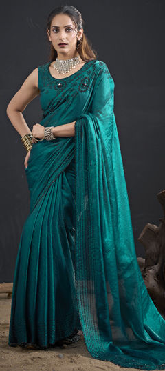 Green color Saree in Tissue fabric with Sequence, Zircon work