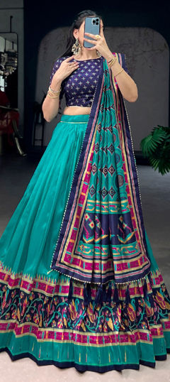 Blue color Lehenga in Tussar Silk fabric with Printed work