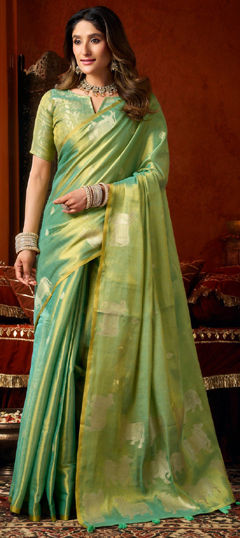 Green color Saree in Tissue fabric with Weaving work