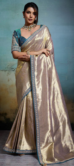 Beige and Brown color Saree in Tissue fabric with Weaving work