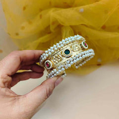 Gold Rodium Polish White and Off White color Bracelet in Brass studded with Pearl