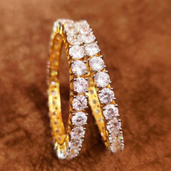 Gold Rodium Polish White and Off White color Bangles in Brass studded with CZ Diamond