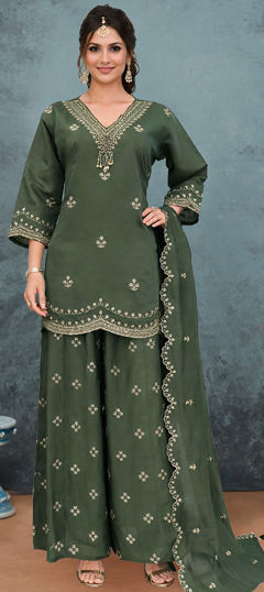 Green color Salwar Kameez in Silk fabric with Embroidered work