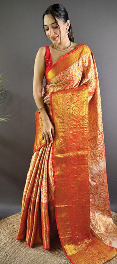 Orange color Saree in Kanjeevaram Silk fabric with Weaving work