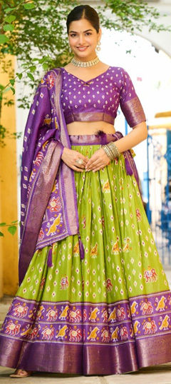 Green color Lehenga in Silk fabric with Weaving work