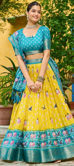 Yellow color Lehenga in Silk fabric with Weaving work