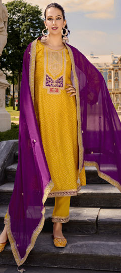 Yellow color Salwar Kameez in Bemberg fabric with Bandhej, Digital Print, Embroidered work