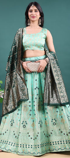 Green color Lehenga in Jacquard fabric with Weaving work
