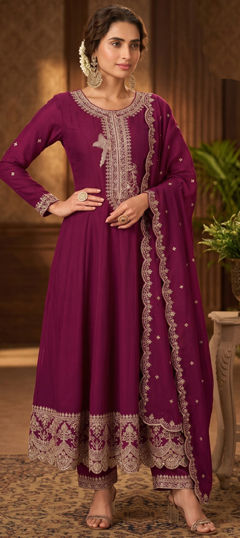 Pink and Majenta color Salwar Kameez in Silk fabric with Embroidered work