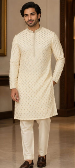 Beige and Brown color Kurta Pyjamas in Art Silk fabric with Thread work