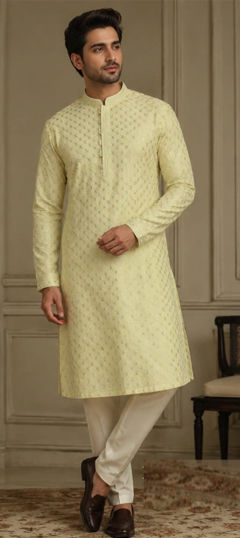Yellow color Kurta Pyjamas in Art Silk fabric with Thread work